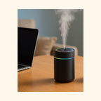 Diffuseur USB noir sur un bureau