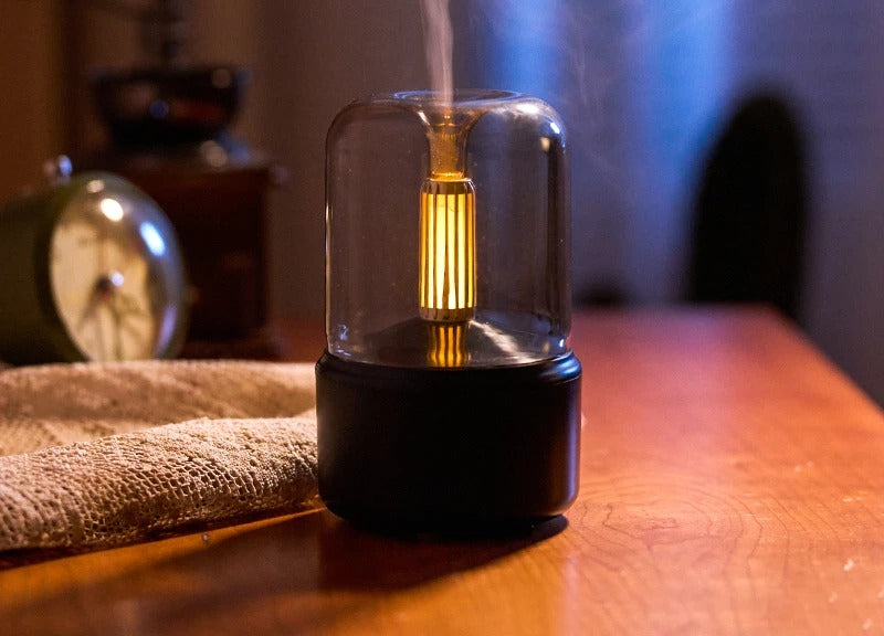 Diffuseur flamme LED noir ambiance nuit — photo réelle